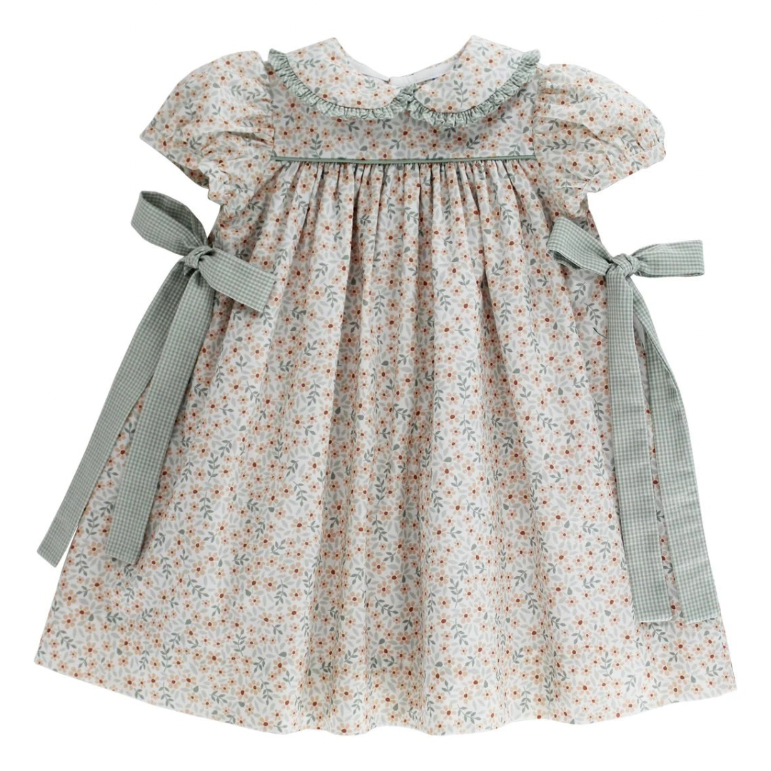 Little girl's toddler floral dress in autumn colors with sage green bows and peach blush flowers